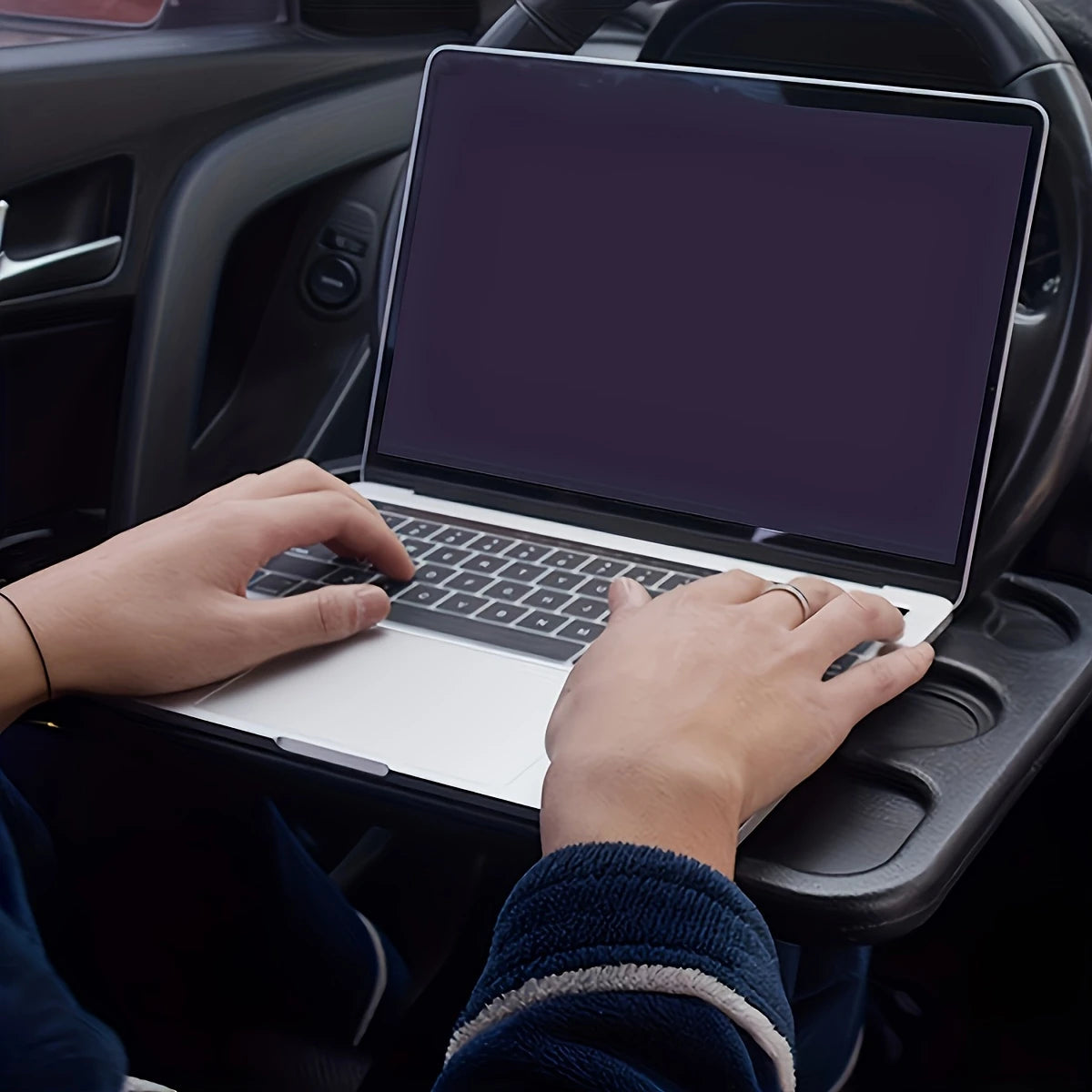 Multi-purpose steering wheel tray for eating, working, or holding drinks in the car
