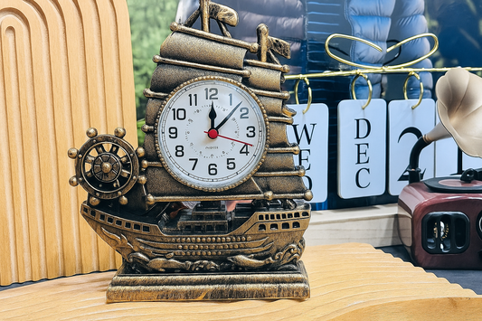 Vintage ship wheel table clock with antique brass finish and nautical design